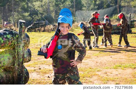 Boy ready for playing paintball Boy ready for playing paintball 70279686