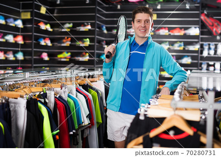 male holding new rocket for tennis male holding new rocket for tennis 70280731