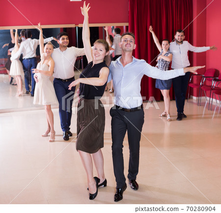 Couples enjoying latin dances 70280904