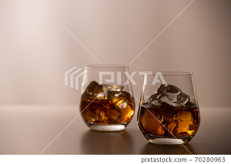Whiskey in a pair of glasses 70280963