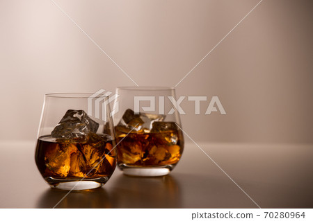 Whiskey in a pair of glasses Whiskey in a pair of glasses 70280964