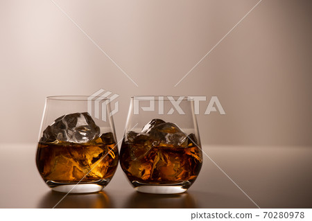 Whiskey in a pair of glasses Whiskey in a pair of glasses 70280978