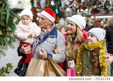 Family portrait at Christmas fair Family portrait at Christmas fair 70281144