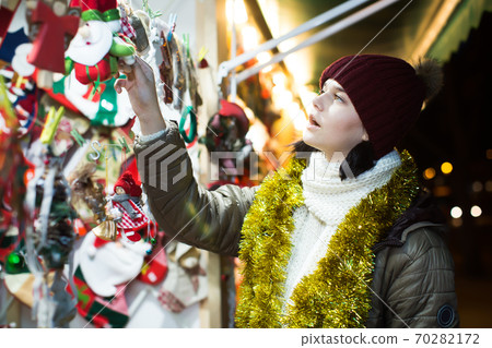 Female customer with Christmas gifts Female customer with Christmas gifts 70282172