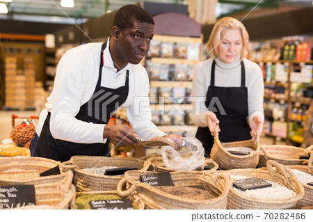 Seller offering bulk foods Seller offering bulk foods 70282486