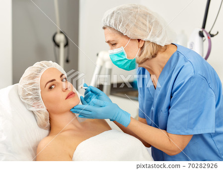 Woman getting ready for plastic surgery 70282926