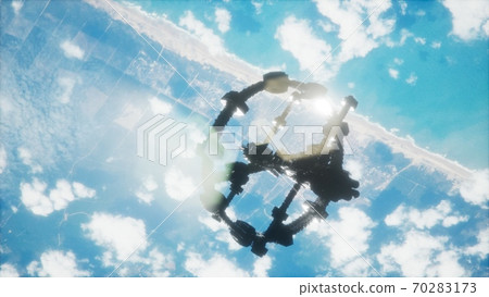 A view of the Earth and a spaceship. ISS is orbiting the Earth 70283173