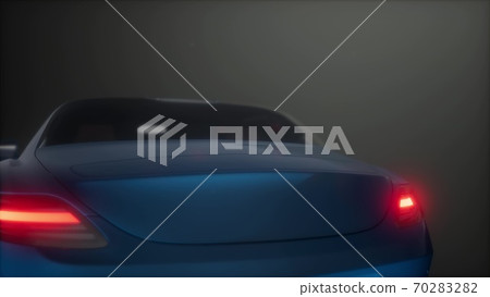 luxury sport car in dark studio with bright lights luxury sport car in dark studio with bright lights 70283282