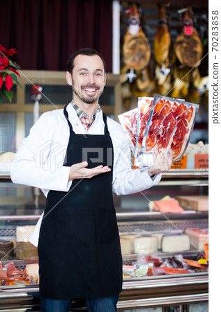 Seller offering sliced bacon 70283858