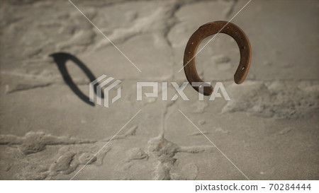 extreme slow motion old rusty metal horseshoe 70284444