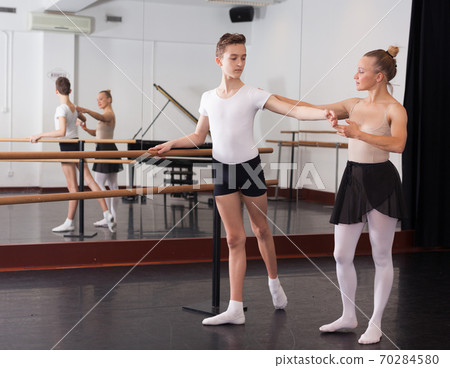 Young artist learns to dance ballet Young artist learns to dance ballet 70284580