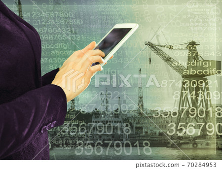 Businesswoman writing sms 70284953