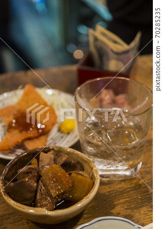 At the standing bar 70285235