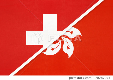 Switzerland and Hong Kong, symbol of national flags from textile. Championship between two countries. 70287074