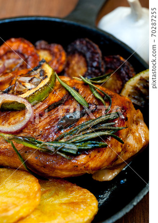 roasted grilled BBQ chicken breast with herbs and spices roasted grilled BBQ chicken breast with herbs and spices 70287255