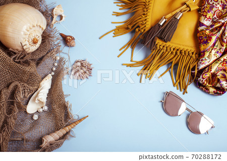 diverse travel girlish stuff on colorful background blue and yellow, nobody tourism lifestyle concept 70288172