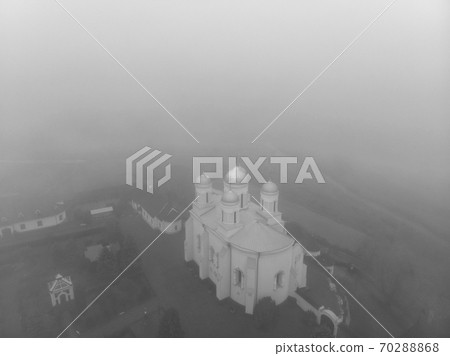 Beautiful view of Zimnensky Svyatogorsky monastery from above. View of the domes and the Assumption Cathedral. 70288868