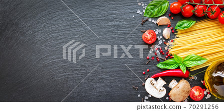 Food ingredients on dark background. Food ingredients on dark background. 70291256