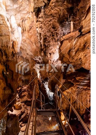 Illuminated picturesque karst rock formations in Balcarka Cave, Moravian Karst, Czech: Moravsky Kras, Czech Republic Illuminated picturesque karst rock formations in Balcarka Cave, Moravian Karst, Czech: Moravsky Kras, Czech Republic 70292808