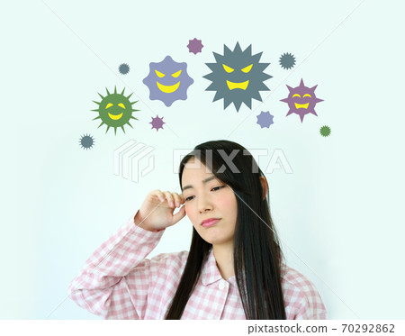 Image of a young woman who is ill due to a virus Image of a young woman who is ill due to a virus 70292862