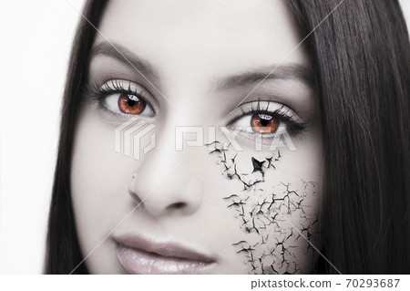 Beautiful woman face close up  70293687