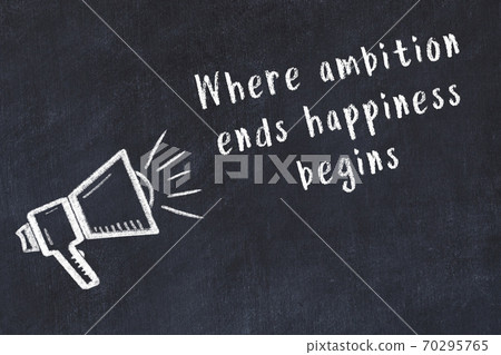 Chalk loudspeaker and wise quote on black desk Chalk loudspeaker and wise quote on black desk 70295765