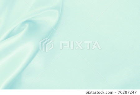 Smooth elegant blue silk or satin luxury cloth texture as abstract background. Luxurious background design Smooth elegant blue silk or satin luxury cloth texture as abstract background. Luxurious background design 70297247