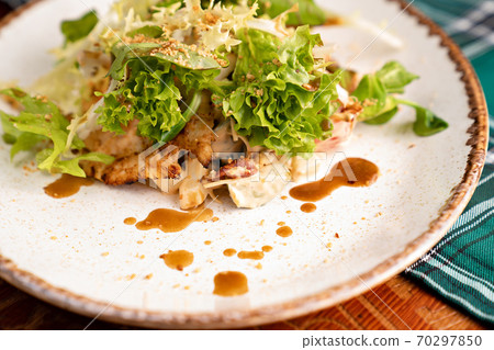 salad closeup. part a white plate.  70297850