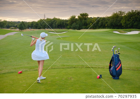 Concentrated Player Woman Professionally Hit Ball . 70297935