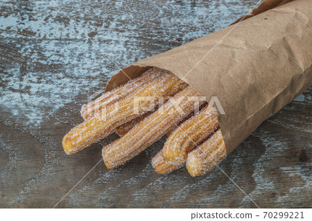 Homemade spanish churros with sugar 70299221