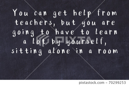 Chalk wise inscription on black chalkboard 70299253