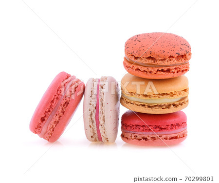 Sweet colorful macarons isolated on white background. 70299801