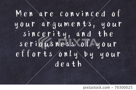 Chalk wise inscription on black chalkboard 70300025