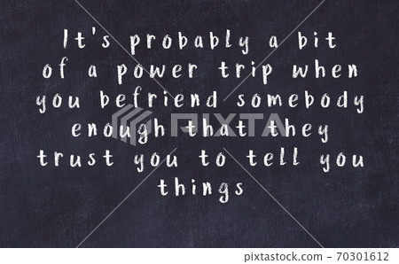 Black chalkboard with wise inscription on it Black chalkboard with wise inscription on it 70301612