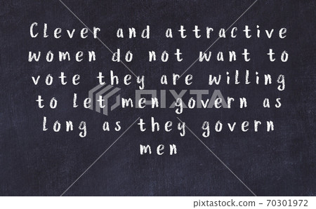 Chalk wise inscription on black chalkboard 70301972