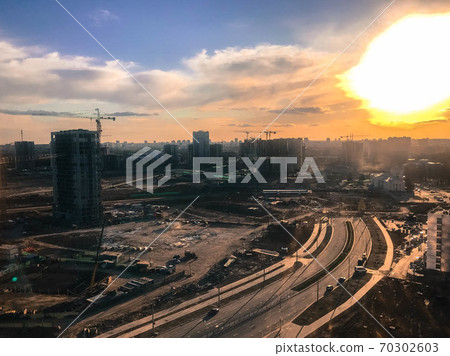 new buildings under the bright scorching sun. new buildings under the bright scorching sun. 70302603