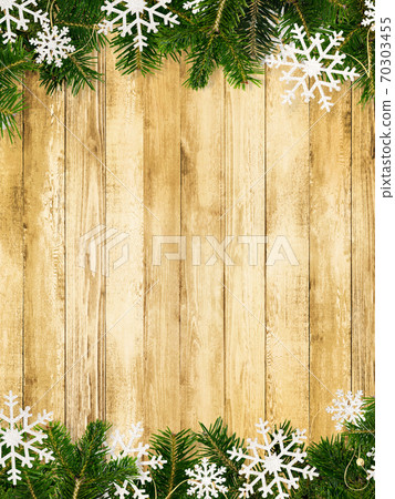 Wood grain background decorated with fir tree and snow ornaments-there are multiple variations 70303455