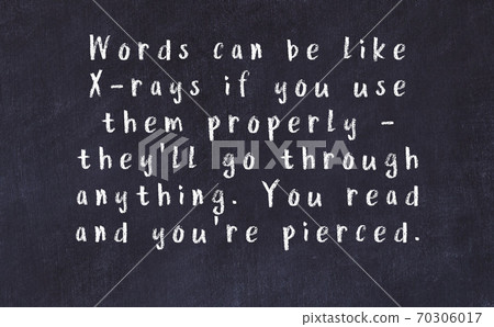 Chalk wise inscription on black chalkboard 70306017