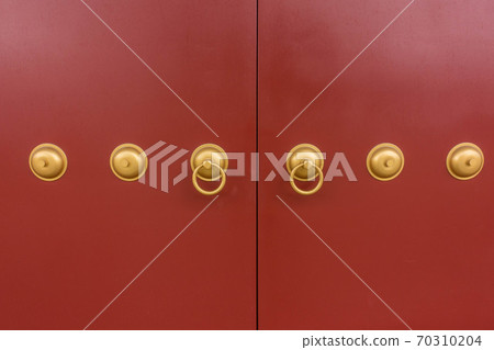 Red Chinese door in a temple 70310204