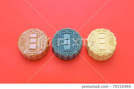 Traditional Mooncake On red background Traditional Mooncake On red background 70310469