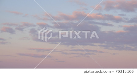 Clouds in the evening sky. Twilight sky as background. 70313106