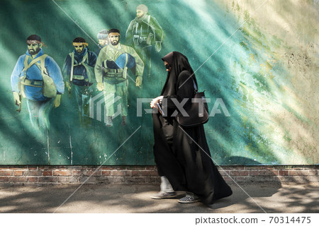 revolutionary fighters mural in downtown tehran city street iran 70314475