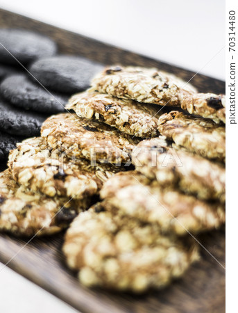 mixed fresh organic biscuit cookies in bakery display 70314480