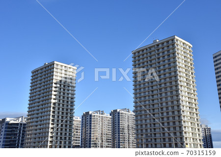 Facade of a new modern high-rise residential buildings. 70315159