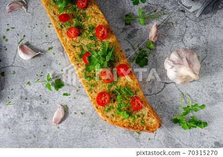 Homemade garlic butter baguette 70315270