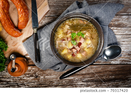 Sour soup in bowl. 70317420