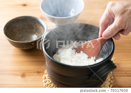 Rice cooked in the pot 70317650