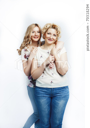 mother with teen daughter together posing happy smiling isolated on white background with copyspace, lifestyle people concept 70318294