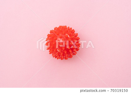 model of Coronavirus disease COVID-19 on pink back model of Coronavirus disease COVID-19 on pink back 70319150