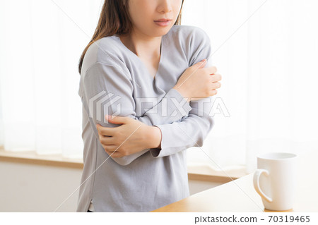 A young woman with poor physical condition A young woman with poor physical condition 70319465